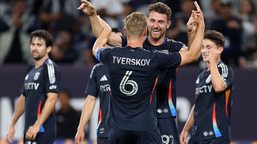 SAN DIEGO, CALIFORNIA – MAY 14: Jeppe Tverskov #6 congratulates Christopher McVey #97 of San Diego FC after his goal during the first half of a game against the Colorado Rapids at Snapdragon Stadium on May 14, 2025 in San Diego, California. (Photo by Sean M. Haffey/Getty Images)