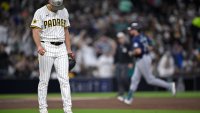 SAN DIEGO, CALIFORNIA – MAY 16: Stephen Kolek #32 of the San Diego Padres reacts on the mound as Cal Raleigh #29 of the Seattle Mariners rounds the bases after hitting a two-run home run during the sixth inning at Petco Park on May 16, 2025 in San Diego, California. (Photo by Orlando Ramirez/Getty Images)