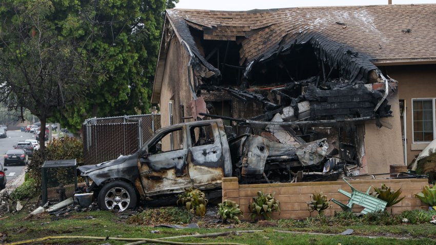 A home is partially destroyed where a small plane crashed into a San Diego, California, residential street on May 22, 2025. The Federal Aviation Authority said a Cessna 550 crashed at around 3:45 am local time. The neighborhood is close to the Montgomery-Gibbs Executive Airport. The crash left a “gigantic debris field” and damaged some 15 homes and parked cars, ABC News quoted the San Diego assistant fire chief as saying. (Photo by Sandy Huffaker / AFP) (Photo by SANDY HUFFAKER/AFP via Getty Images)