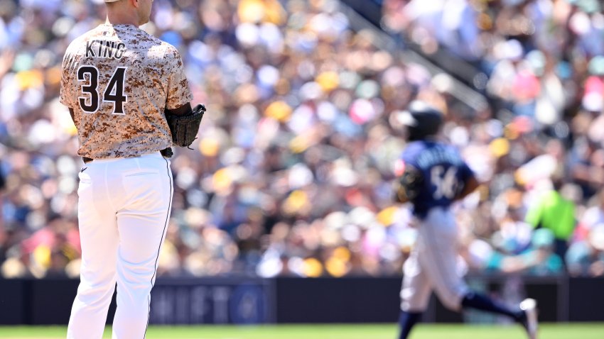 SAN DIEGO, CALIFORNIA – MAY 18: Randy Arozarena #56 of the Seattle Mariners rounds the bases after hitting a home run as Michael King #34 of the San Diego Padres looks on during the fourth inning at Petco Park on May 18, 2025 in San Diego, California. (Photo by Orlando Ramirez/Getty Images)