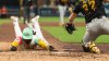 San Diego Padres slide by Pittsburgh Pirates at sold-out Petco Park