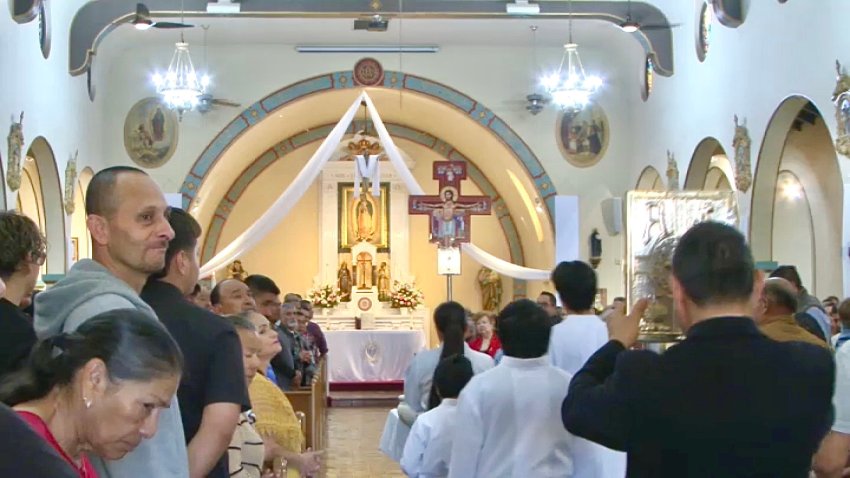 Parishioners celebrate mass, Sunday morning, at Our Lady of Guadalupe Catholic Church in Logan Heights. May 11, 2025.