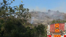 Smoke is seen in Poway from a brush fire, May 24, 2025.