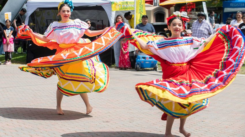 Natalie Beltran, 16, left and sister Analie Beltran, 11, with the Ballet Folklorico Los Mirasoles perform a traditional Mexican dance at El Concilio's annual Cinco De Mayo Festival at the Weber Point Events Center in downtown Stockton on May 5, 2024.