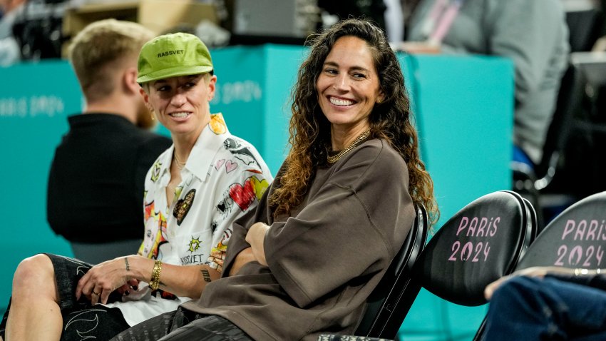 Megan Rapinoe and Sue Bird watch a women's basketball semifinal game during the Paris 2024 Olympic Summer Games.