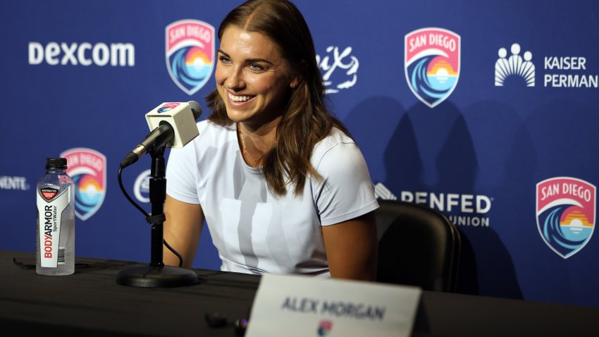 Sep 6, 2024; San Diego, California, USA; San Diego Wave FC forward Alex Morgan (13) speaks during a press conference announcing her retirement at Snapdragon Stadium. Mandatory Credit: Abe Arredondo-Imagn Images