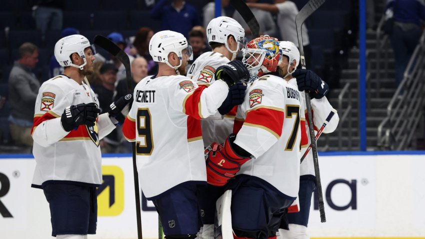 Panthers players celebrate Game 5 win over Lightning