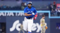 May 20, 2025; Toronto, Ontario, CAN; Toronto Blue Jays first baseman Vladimir Guerrero Jr. (27) runs the bases after hitting a home run against the San Diego Padres during the first inning at Rogers Centre. Mandatory Credit: Nick Turchiaro-Imagn Images