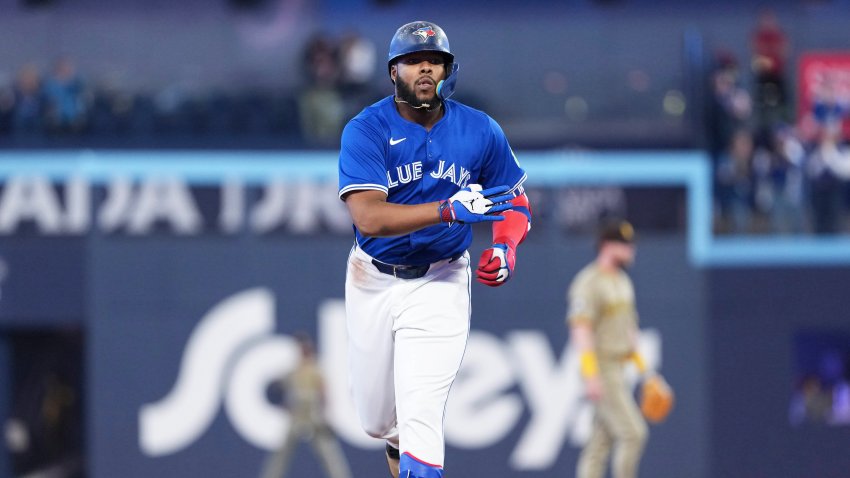 May 20, 2025; Toronto, Ontario, CAN; Toronto Blue Jays first baseman Vladimir Guerrero Jr. (27) runs the bases after hitting a home run against the San Diego Padres during the first inning at Rogers Centre. Mandatory Credit: Nick Turchiaro-Imagn Images