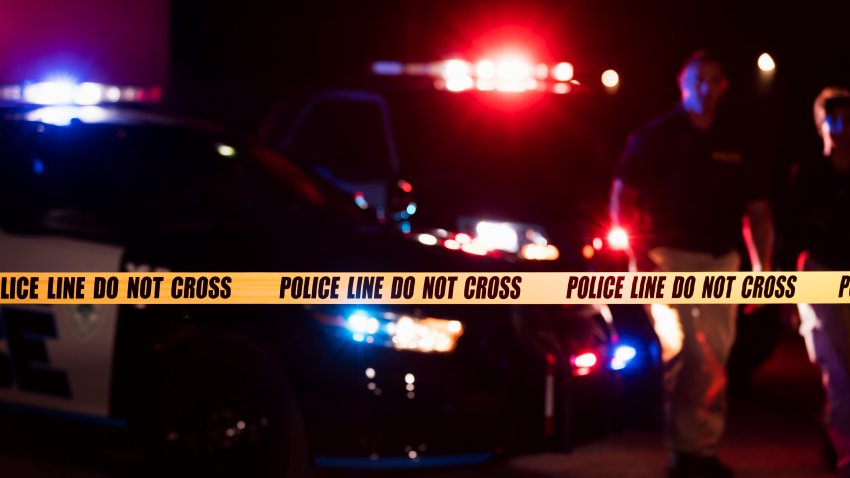 This stock image shows officers at a crime scene.