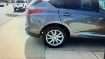A photo of an SUV parked in a driveway in Clairemont.