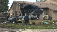 Damage after a plane crash in a quarter of San Diego left on May 22, 2025.