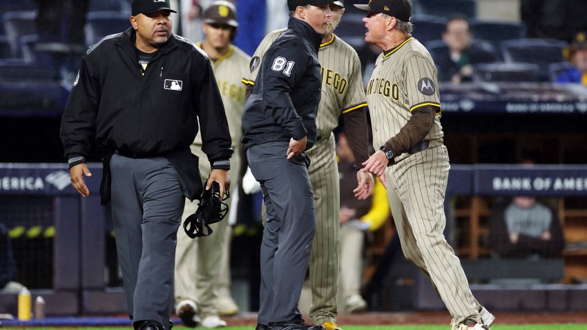 NEW YORK, NEW YORK – MAY 05: Manager Mike Shildt #8 of the San Diego Padres exchanges words with umpire Adrian Johnson #80 and umpire Quinn Wolcott #81 during the eighth inning against the New York Yankees at Yankee Stadium on May 05, 2025 in the Bronx borough of New York City. The Padres won 4-3. (Photo by Sarah Stier/Getty Images)
