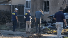 National Transportation Safety Board investigators at the scene where a small plane crashed in Murphy Canyon on Thursday, May 22, 2025.