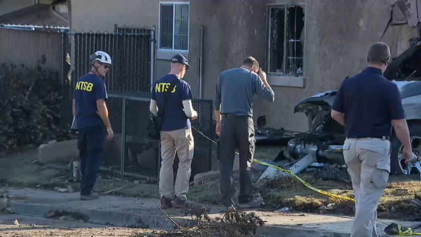 National Transportation Safety Board investigators at the scene where a small plane crashed in Murphy Canyon on Thursday, May 22, 2025.