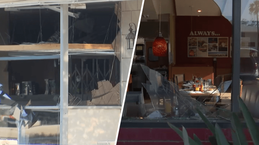 Shattered windows are pictured at businesses following the Palm Springs car bombing.