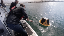 Crews from Hyper Kelp and the Port of San Diego deploy the first smart buoy into San Diego Bay.