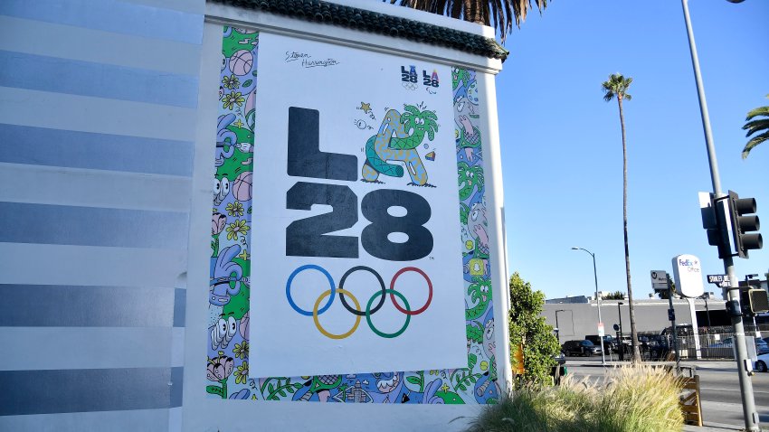LOS ANGELES, CALIFORNIA – SEPTEMBER 01:  The LA28 Olympic mural by Artist Steven Harrington is displayed on the corner of Stanley street and Sunset Boulevard on September 01, 2020 in Los Angeles, California. The mural is one of three LA28 logo murals revealed throughout Los Angeles to celebrate the upcoming Games of the XXXIV Olympiad. The 2028 Summer Olympics are scheduled to take place from July 21, 2028 to August 6, 2028.  (Photo by Frazer Harrison/Getty Images)