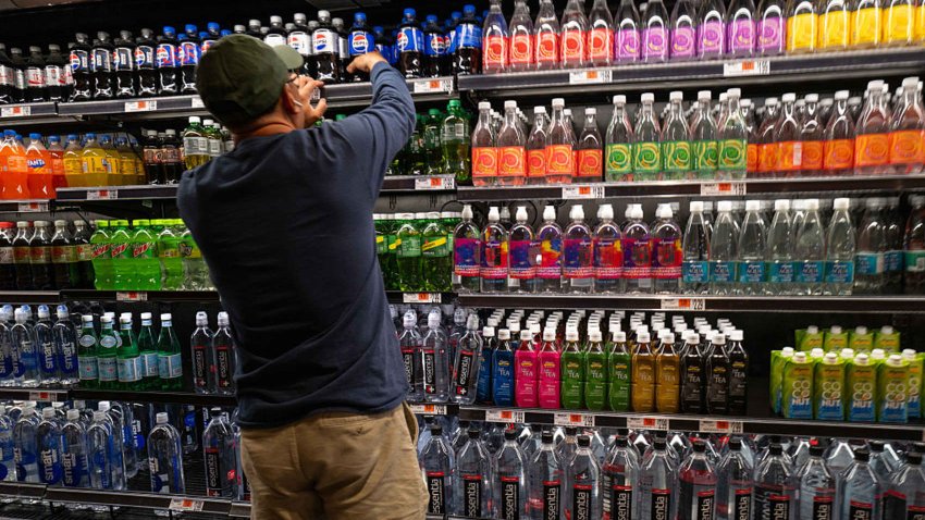 A man stocks shelves at a grocery store in Brooklyn on May 13, 2025 in New York City.