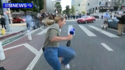 WATCH: Reporter shot with rubber bullet while covering protests in Los Angeles