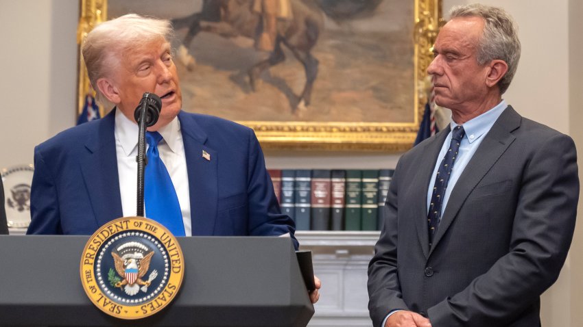 FILE – President Donald Trump, from left, speaks as Health and Human Services Secretary Robert F. Kennedy Jr.,  during an event in the Roosevelt Room at the White House, May 12, 2025, in Washington.