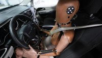 A THOR-5F female crash test dummy is shown in a drivers seat at Humanetics in Farmington Hills, Mich., Tuesday, June 10, 2025.