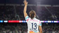 SAN DIEGO, CALIFORNIA – SEPTEMBER 08: Alex Morgan #13 of San Diego Wave FC waves to fans after the game against North Carolina Courage at Snapdragon Stadium on September 08, 2024 in San Diego, California. Morgan bid farewell to fans and fellow athletes after announcing her retirement from the game three days earlier, marking this game as her last. (Photo by Meg Oliphant/Getty Images)
