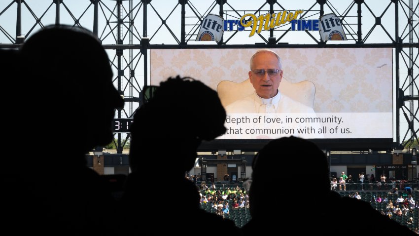 CHICAGO, ILLINOIS – JUNE 14: Pope Leo XIV addresses Catholic faithful on the scoreboard at Rate Field, home to the Chicago White Sox, during a celebration and mass to honor his selection as Pope on June 14, 2025 in Chicago, Illinois. Born Robert Prevost in Chicago and raised in nearby south suburban Dolton, Pope Leo XIV is the first American leader of the Catholic Church. He is also a Chicago White Sox baseball fan.  (Photo by Scott Olson/Getty Images)
