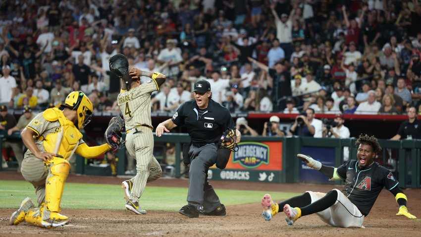 PHOENIX, ARIZONA – JUNE 14: Geraldo Perdomo #2 of the Arizona Diamondbacks reacts after scoring the game-winning run past catcher Elias Díaz #17 of the San Diego Padres during the ninth inning of the MLB game at Chase Field on June 14, 2025 in Phoenix, Arizona. The Diamondbˆacks defeated the Padres 8-6. (Photo by Christian Petersen/Getty Images)