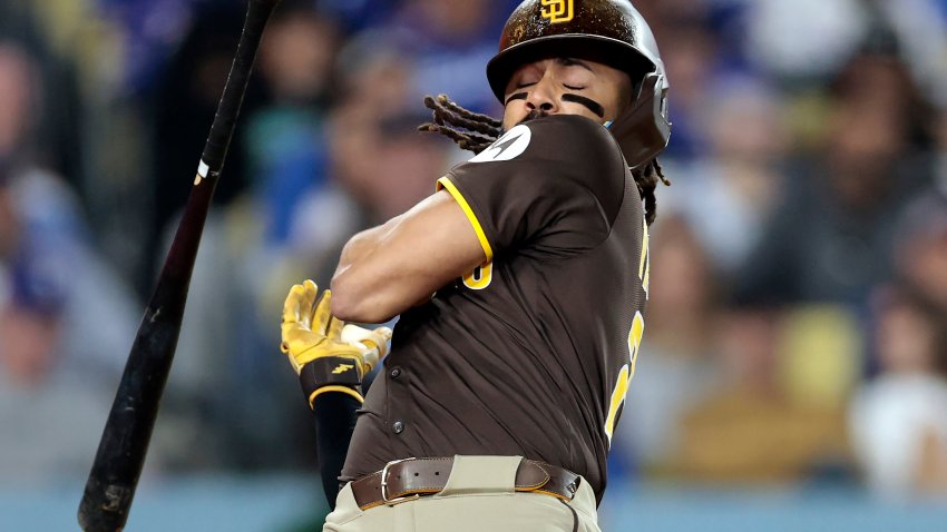 LOS ANGELES, CALIFORNIA – JUNE 19:  Fernando Tatis Jr. #23 of the San Diego Padres drops his bat after a close pitch against the Los Angeles Dodgers in the seventh inning at Dodger Stadium on June 19, 2025 in Los Angeles, California. (Photo by Ronald Martinez/Getty Images)