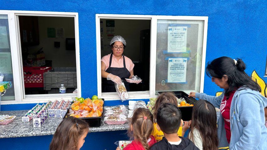 Children lined up to make their choice for  free lunch at the Boys & Girls Club of Vista, June 12, 2025.