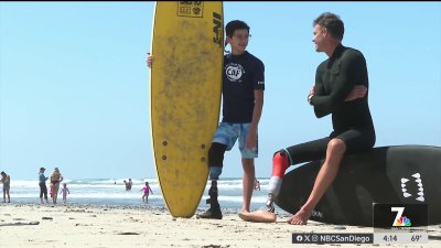 Surfers who both lost legs in shark attacks pair up to catch North County waves