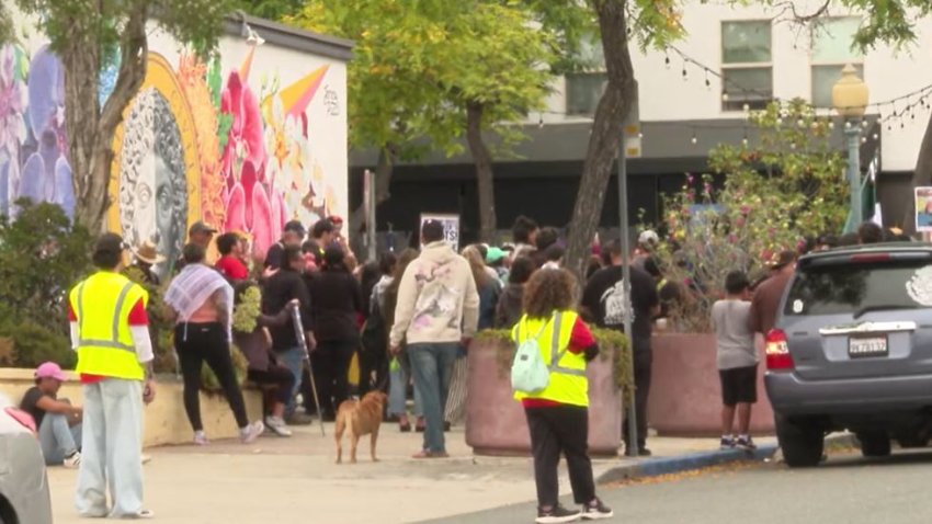 Protesters gather on Saturday, June 7, to protest against recent ICE raid in South Park.