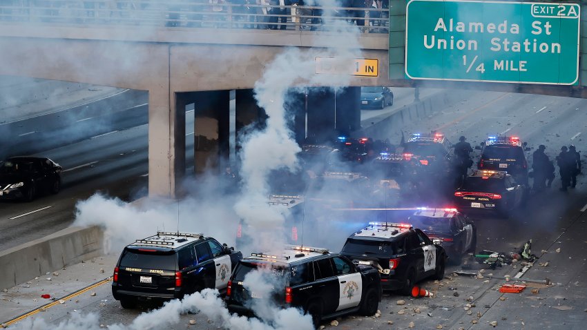 LOS ANGELES, CALIFORNIA – JUNE 08: California Highway Patrol (CHP) cars, some damaged, are lined up along the 101 freeway after officers cleared protesters from the area on June 08, 2025 in Los Angeles, California. Tensions in the city remain high after the Trump administration called in the National Guard against the wishes of city leaders following two days of clashes with police during a series of immigration raids. More protests are scheduled for today. (Photo by Mario Tama/Getty Images)