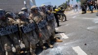 LOS ANGELES, CALIFORNIA – JUNE 08: Demonstrators protest outside a downtown jail in Los Angeles following two days of clashes with police during a series of immigration raids on June 08, 2025 in Los Angeles, California. Tensions in the city remain high after the Trump administration called in the National Guard against the wishes of city leaders. (Photo by Spencer Platt/Getty Images)