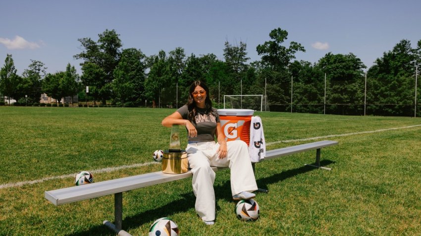 Gatorade Soccer Player of the year Addison Halpern sits next to trophy.
