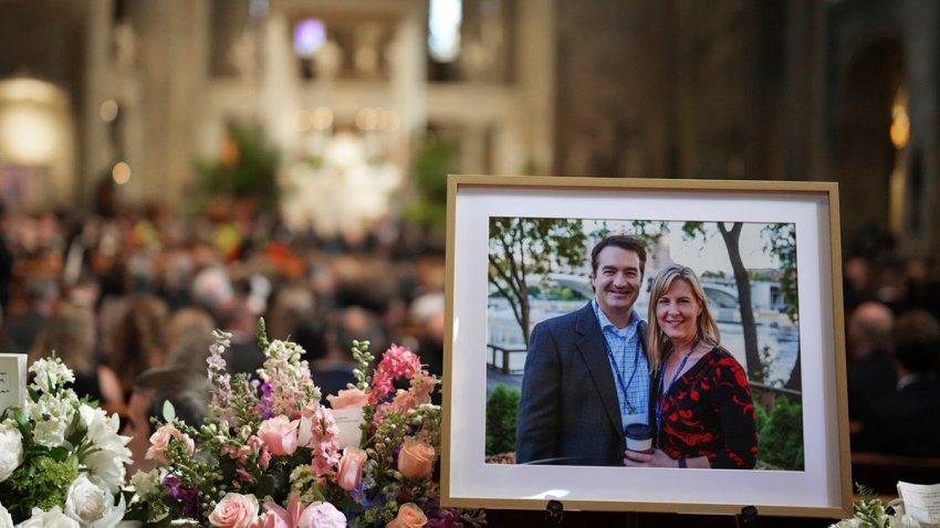 Pictures of Mark and Melissa Hortman are set up inside the sanctuary at the Basilica of St. Mary's during funeral services in Minneapolis, Minn., on June 28, 2025.