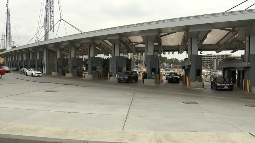 Cars wait behind turnstiles at the San Ysidro Port of Entry. July 10, 2025.
