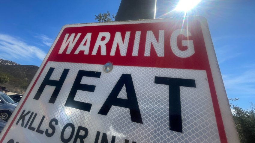 A heat warning sign in San Diego County on Aug. 20, 2025.