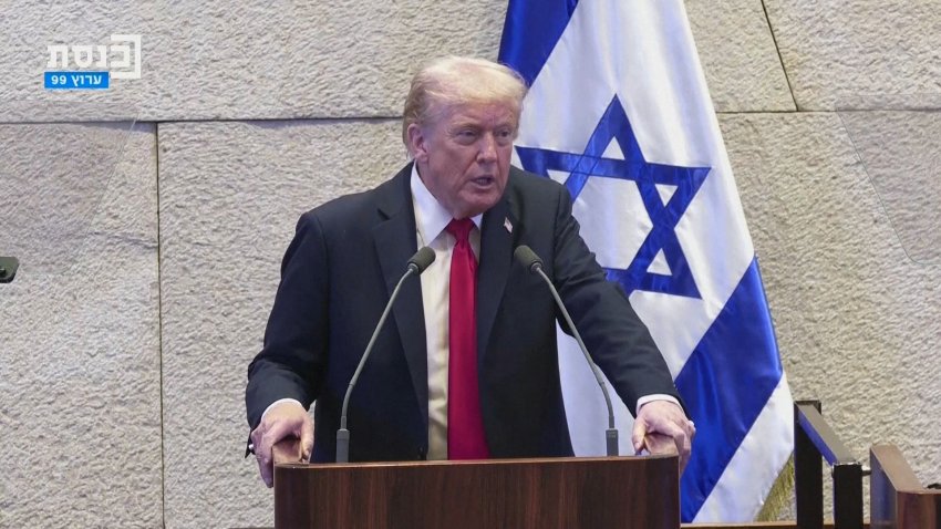 Trump stands at Knesset podium