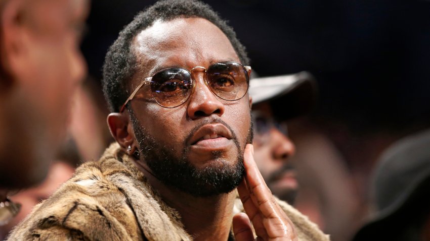 FILE &#8211; Sean &#8220;Diddy&#8221; Combs sits courtside in the second half of an NBA basketball game between the Brooklyn Nets and the New York Knicks, March 12, 2017, in New York.