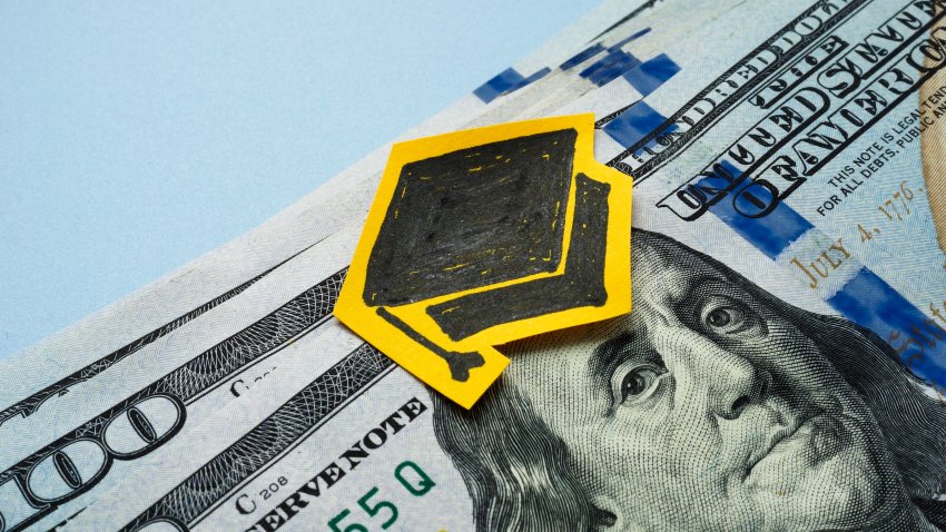 Graduation cap and dollars. Scholarship or student loan concept.
