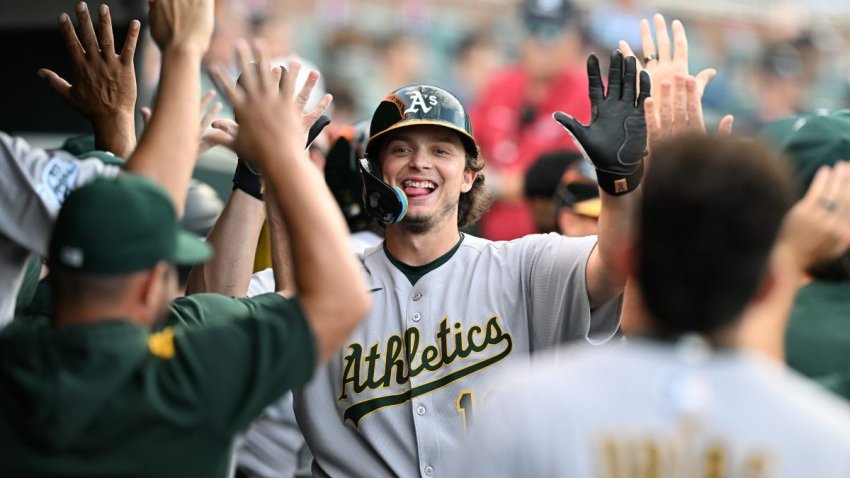 Jun 25, 2025; Detroit, Michigan, USA; Athletics first baseman Nick Kurtz (16) celebrates in the dugout after hitting a three-run home run against the Detroit Tigers in the third inning at Comerica Park. Mandatory Credit: Lon Horwedel-Imagn Images