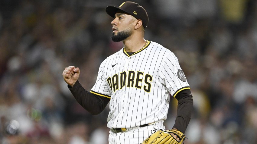 Sep 27, 2025; San Diego, California, USA; San Diego Padres relief pitcher Robert Suarez (75) pumps his fist after the Padres beat the Arizona Diamondbacks at Petco Park.