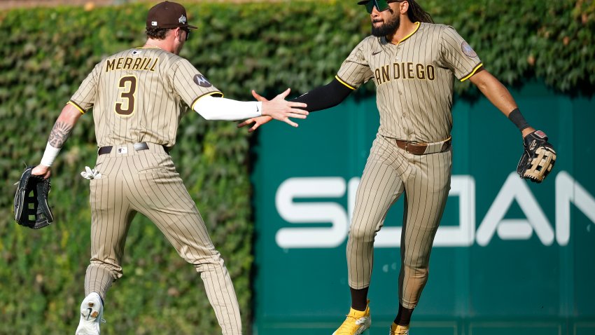 Chicago, Illinois &#8211; October 1, 2025: Fernando Tatis Jr. #23 of the San Diego Padres celebrates with Jackson Merrill #3 after catching a fly ball by Nico Hoerner #2 of the Chicago Cubs in the eighth inning during Game 2 of the NL Wild Card Series at Wrigley Field on October 1, 2025 in Chicago, Illinois. (Photo by K.C. Alfred / The San Diego Union-Tribune via Getty Images)