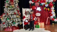 Santa visited with hundreds of children, Saturday, partnered with the Chicano Federation. Alek Martinez, 6, is with Santa, December 6, 2025. 