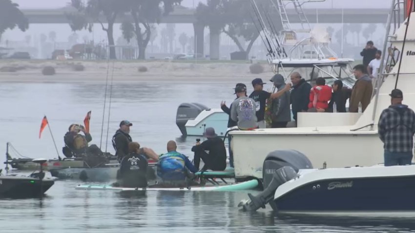Image taken at the paddle out honoring the life off Mikey Rijavec a popular fisherman from Ocean Beach.