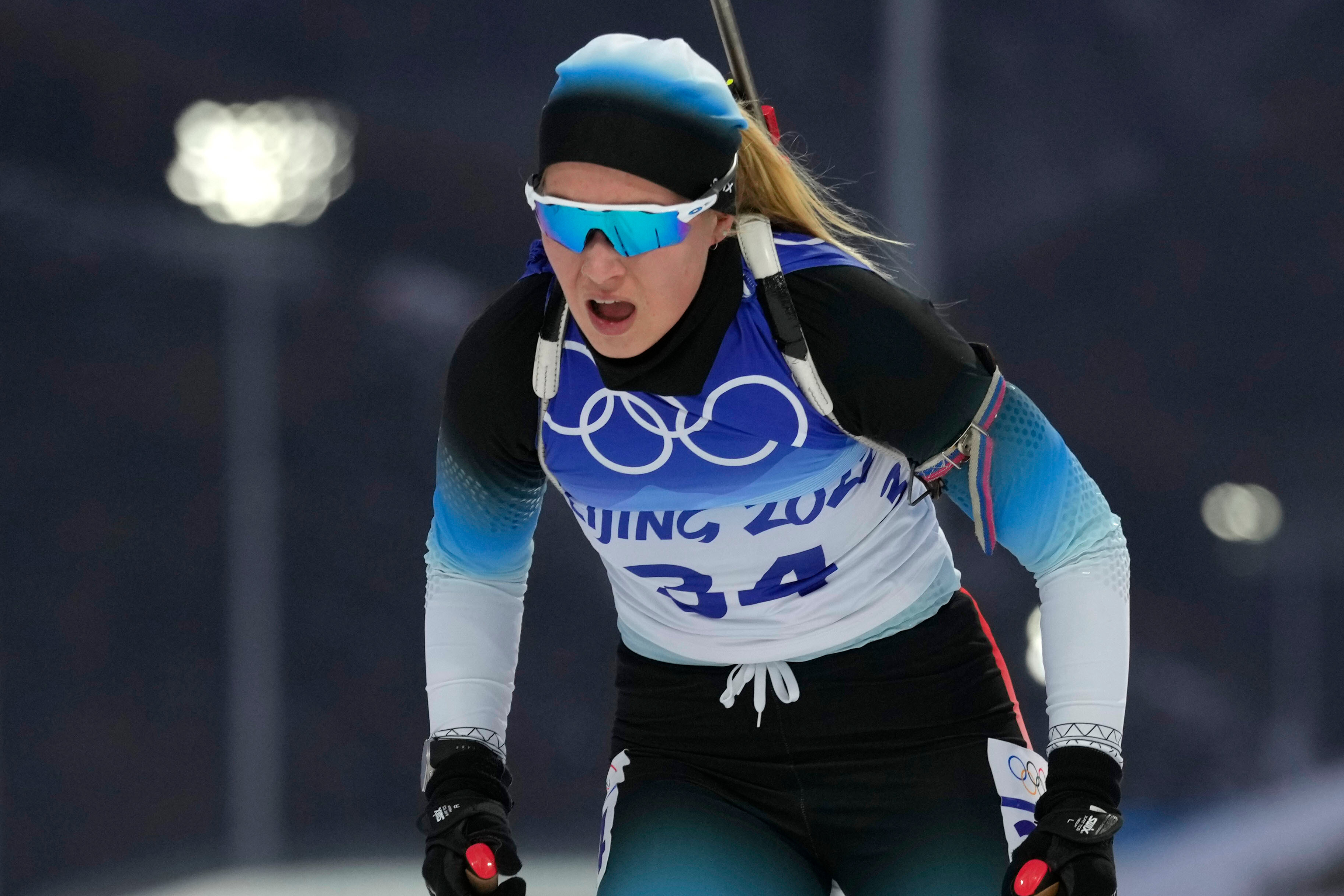 Greenland biathlete pursues Olympic dream while anxious about threats to her homeland