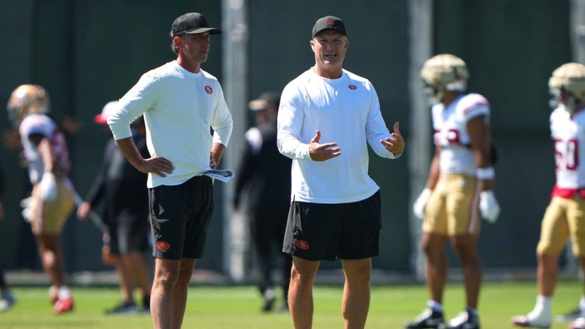 SANTA CLARA, CALIFORNIA – AUGUST 04: Head coach Mike Shanahan (L) and general manager John Lynch (R) of the San Francisco 49ers looks on during practice at training camp at SAP Performance Facility on August 04, 2025 in Santa Clara, California. (Photo by Thearon W. Henderson/Getty Images)