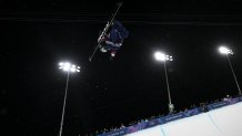 Team USA's Chloe Kim competes in the Women’s Snowboard Halfpipe Final on day six.